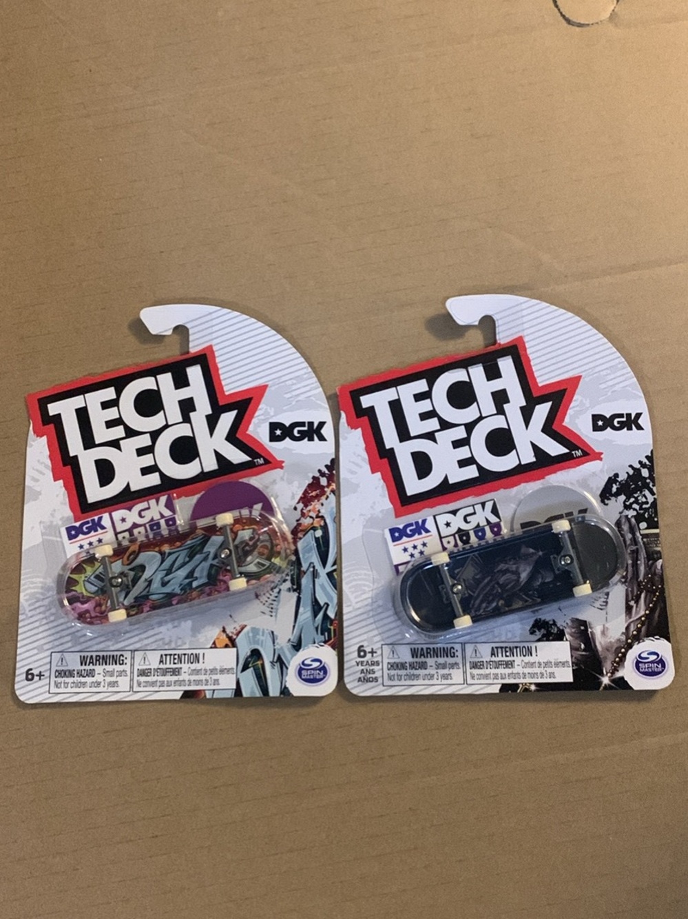 Tech Deck DGK Mini Fingerboards - Pair with Graffiti & Praying Hands Holographic